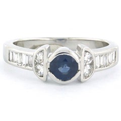 Ring with sapphire and diamonds up to 0.70ct 18k gold 4.8 grams