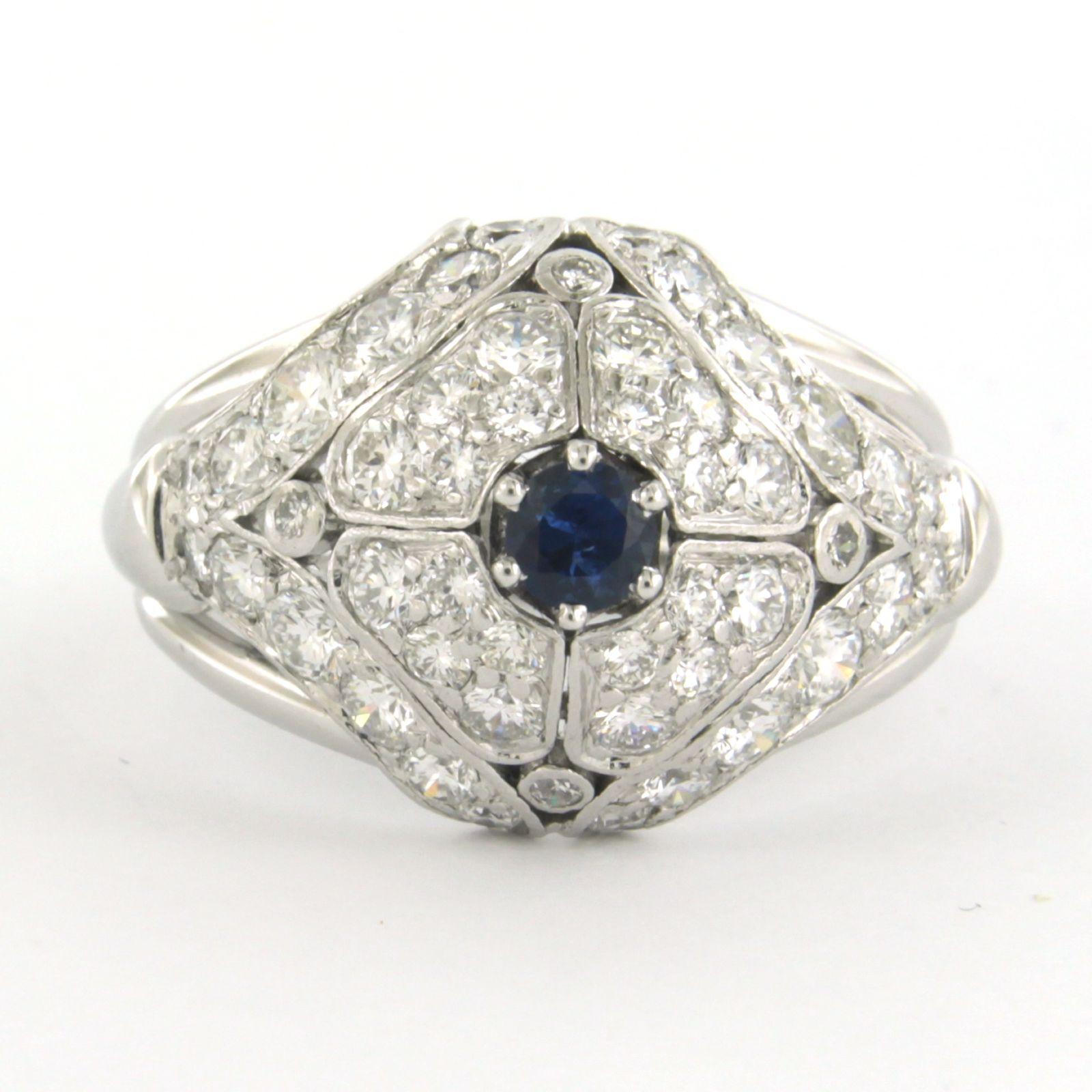 14k white gold ring set with sapphire and brilliant cut diamond. 2.00ct - F/G - VS/SI - ring size U.S. 9.25 - EU. 19 (60)

detailed description:

the top of the ring is 1.6 cm wide by 8.6 mm high

weight 8.9 grams

ring size US 9.25 - EU. 19 (60),