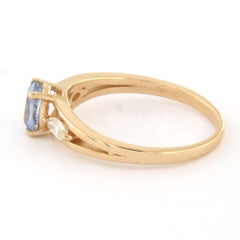 Ring with sapphire and marquise shaped diamonds up to 0.24ct 18k gold