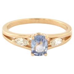 Ring with sapphire and marquise shaped diamonds up to 0.24ct 18k gold