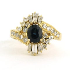 Ring with sapphire, taper and brilliant cut diamonds up to 0.75ct 18k gold