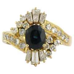 Anillo con zafiro, diamantes talla cónica y brillante hasta 0,75ct Oro de 18k