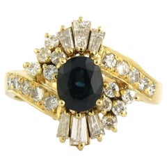 Ring with sapphire, taper and brilliant cut diamonds up to 0.75ct 18k gold