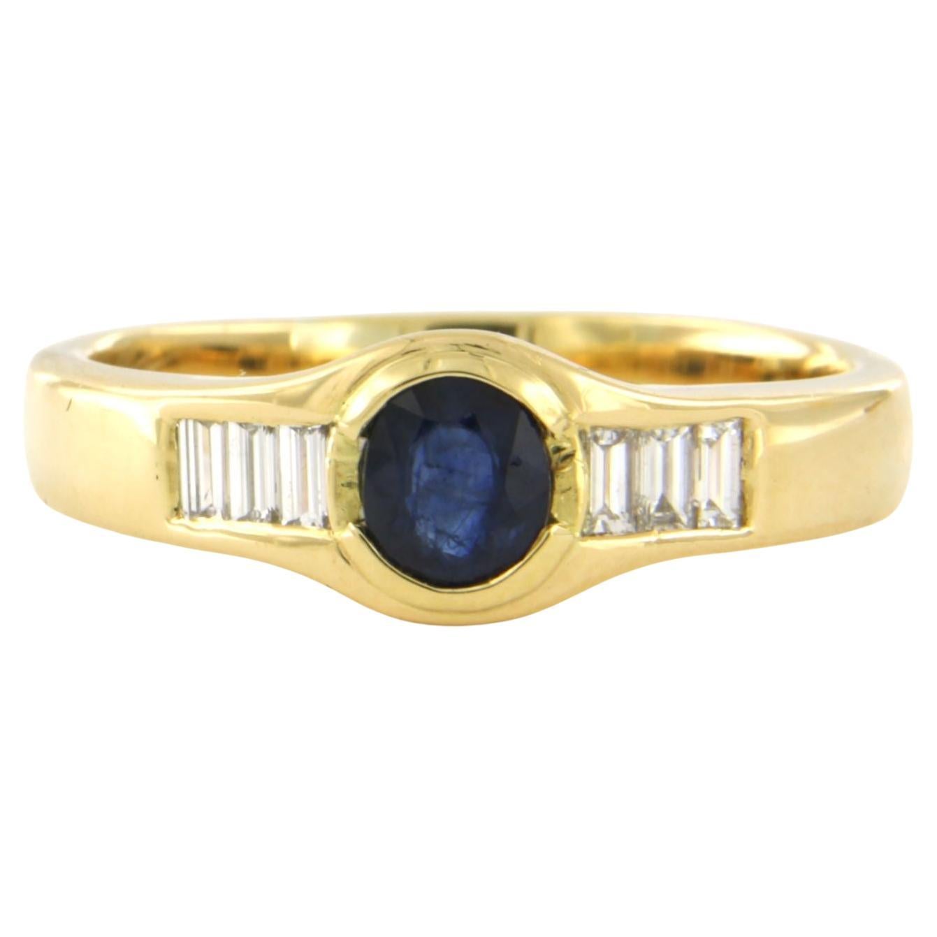 Ring with sapphire up to 0.70ct and baguette cut diamonds up to 0.50ct 18k gold