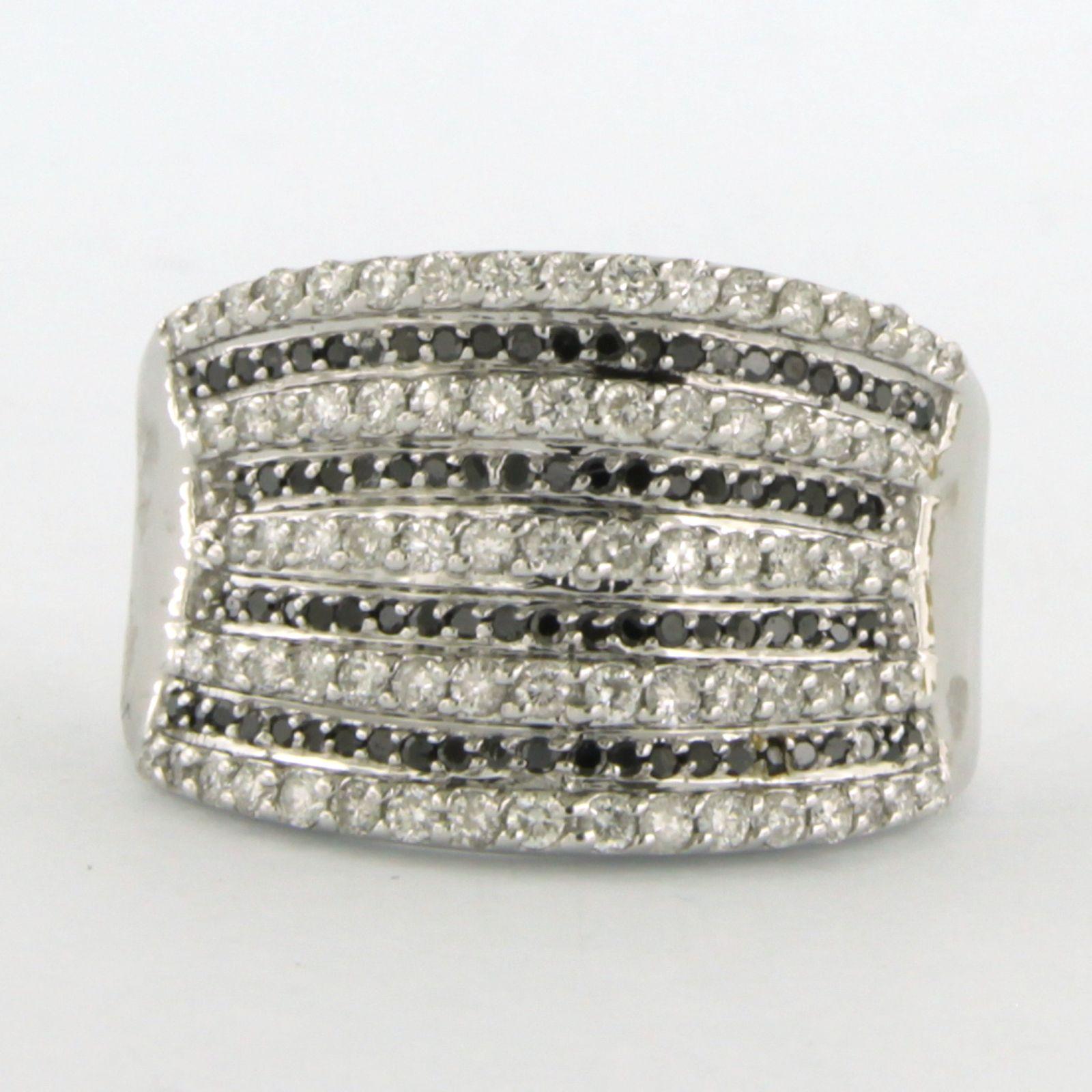 Ring with single cut black and brilliant cut white diamonds up to 1.50ct 14kgold