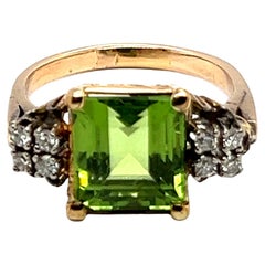 Anello con peridoto e diamanti di 3,50 carati in oro rosso e bianco