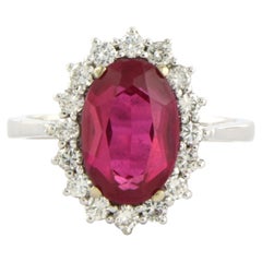 Ring with synthetich ruby and brilliant cut diamonds up to 0.56ct 14k gold