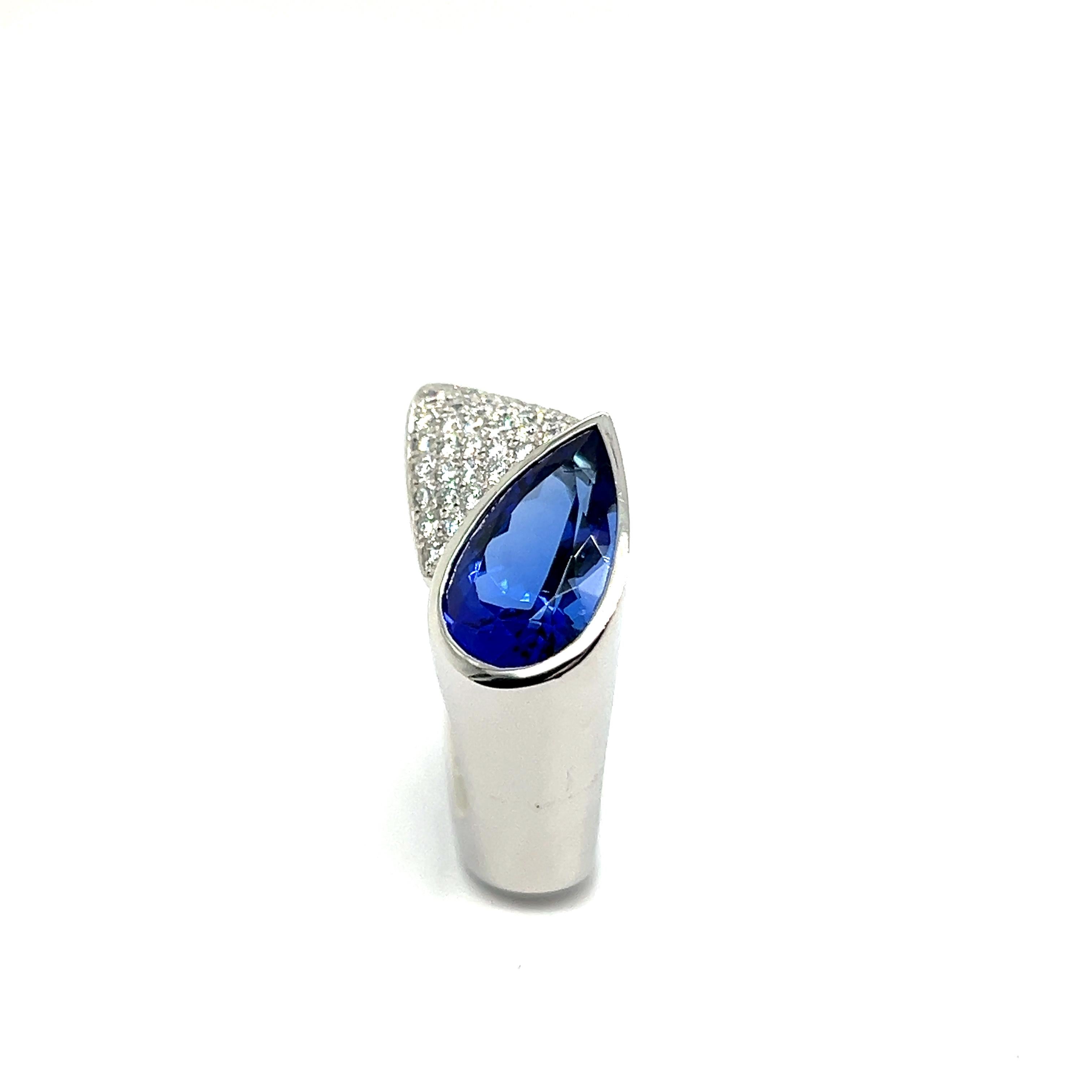 Modern Ring with Tanzanite & Diamonds in 18 Karat White Gold For Sale