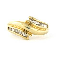 Ring with tapered cut diamonds up to 0.25ct 18k yellow gold 7.9 grams