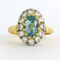 Bague avec topaze et diamants taille brillant jusqu'à 0,60ct Or 18k 5,5 grammes