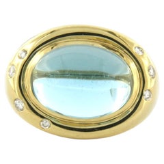 Bague avec topaze et diamants taille brillant jusqu'à 0,15ct Or 18k 10,0 grammes