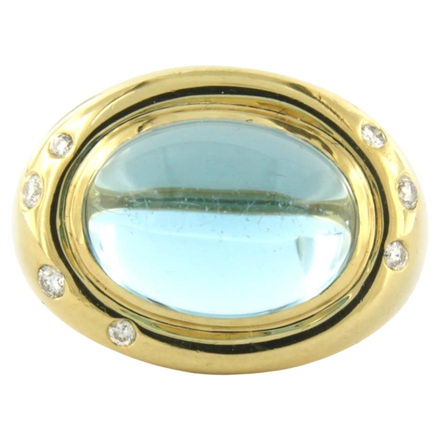Ring with topaz and brilliant cut diamonds up to 0.15ct 18k yellow gold