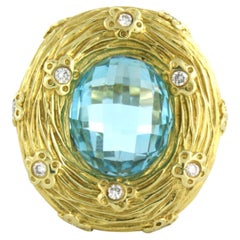Ring with topaz and brilliant cut diamonds up to 0.22ct 18k gold 16.7 grams