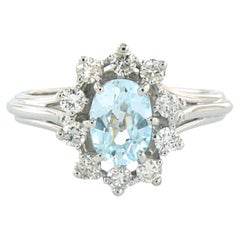 Bague avec topaze et diamants taille brillant jusqu'à 0,30ct Or blanc 18k