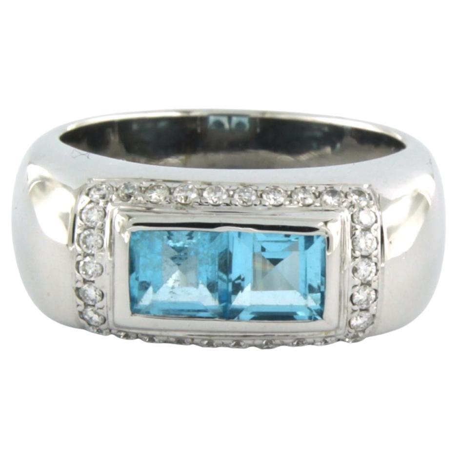 Ring with topaz and brilliant cut diamonds up to 0.30ct 18k white gold