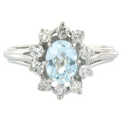 Anello con topazio e diamanti taglio brillante fino a 0,40ct in oro 18k 4,0 grammi