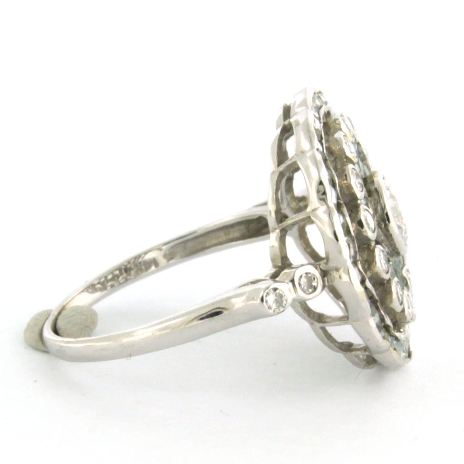 Brilliant Cut Ring with topaz and brilliant cut diamonds up to 0.65ct 14k white gold For Sale