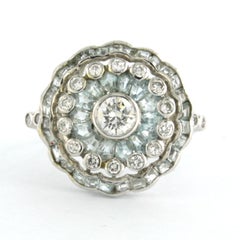 Ring with topaz and brilliant cut diamonds up to 0.65ct 3.0 grams 14k white gold