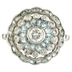 Ring with topaz and brilliant cut diamonds up to 0.65ct 3.0 grams 14k white gold