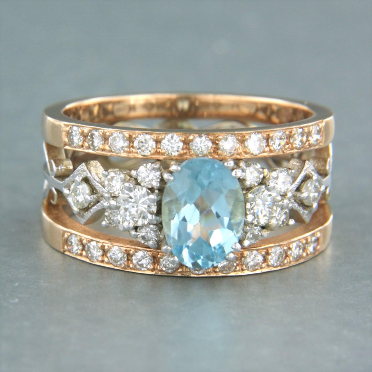 14k bicolor gold band ring with a harp motif, set with a central oval facet-cut topaz and a ring surrounded by brilliant-cut diamonds up to 0.75 ct - ring size U.S. 7.25 - EU 17.5 (55)

Detailed description:

The front of the ring is 4.2 mm high and
