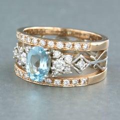Ring with topaz and brilliant cut diamonds up to 0.75ct 18k gold 6.9 grams