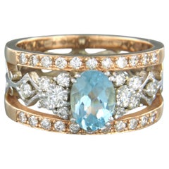 Ring with topaz and brilliant cut diamonds up to 0.75ct 18k gold 6.9 grams
