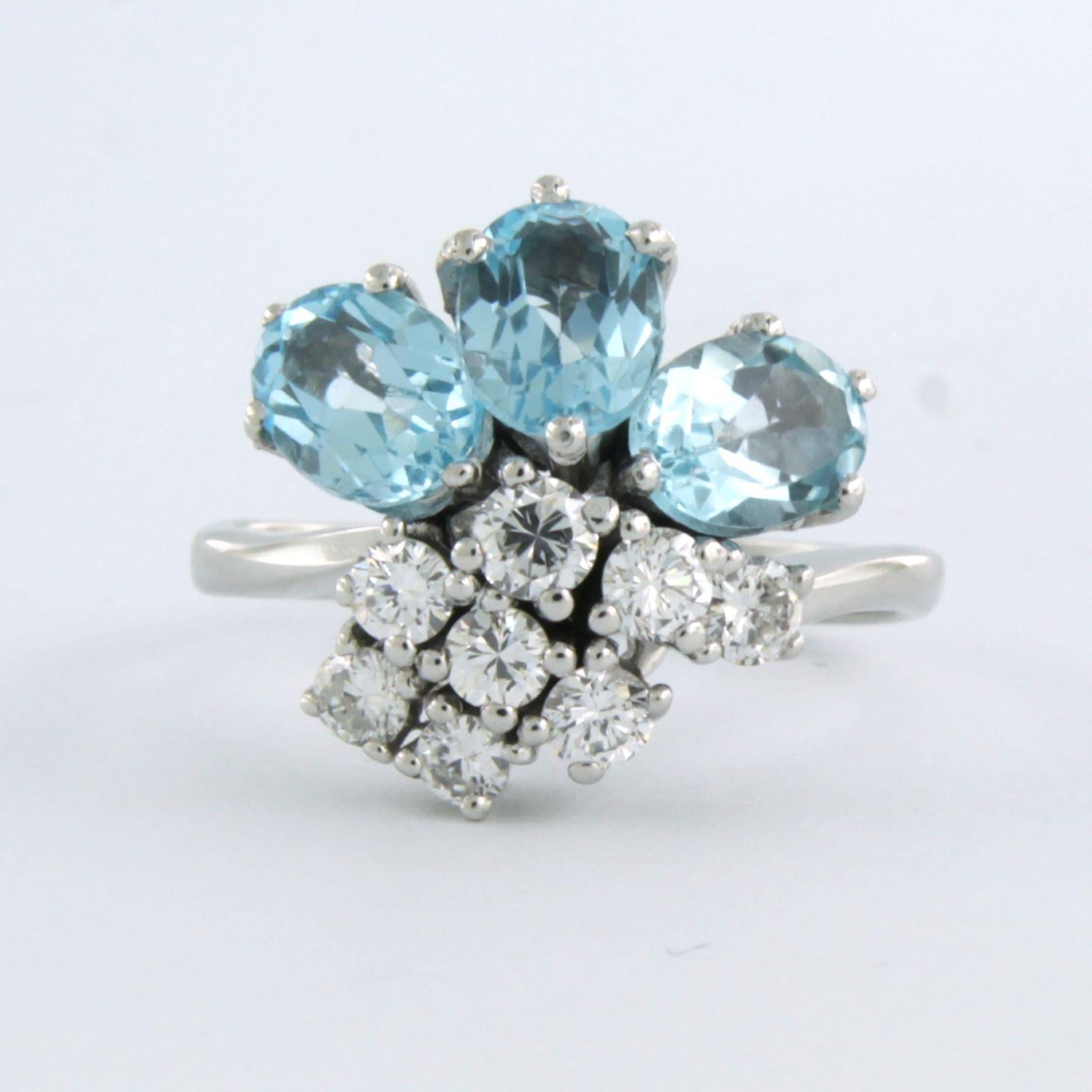 14k gold ring with blue topaz. 2.40ct and brilliant cut diamond up to. 0.40ct - F/G - VS/SI - ring size U.S. 7.25 - EU. 17.5(55)

detailed description:

the top of the ring is 1.6 cm wide by 8.3 mm high

weight 5.3 grams

ring size U.S. 7.25 - EU.
