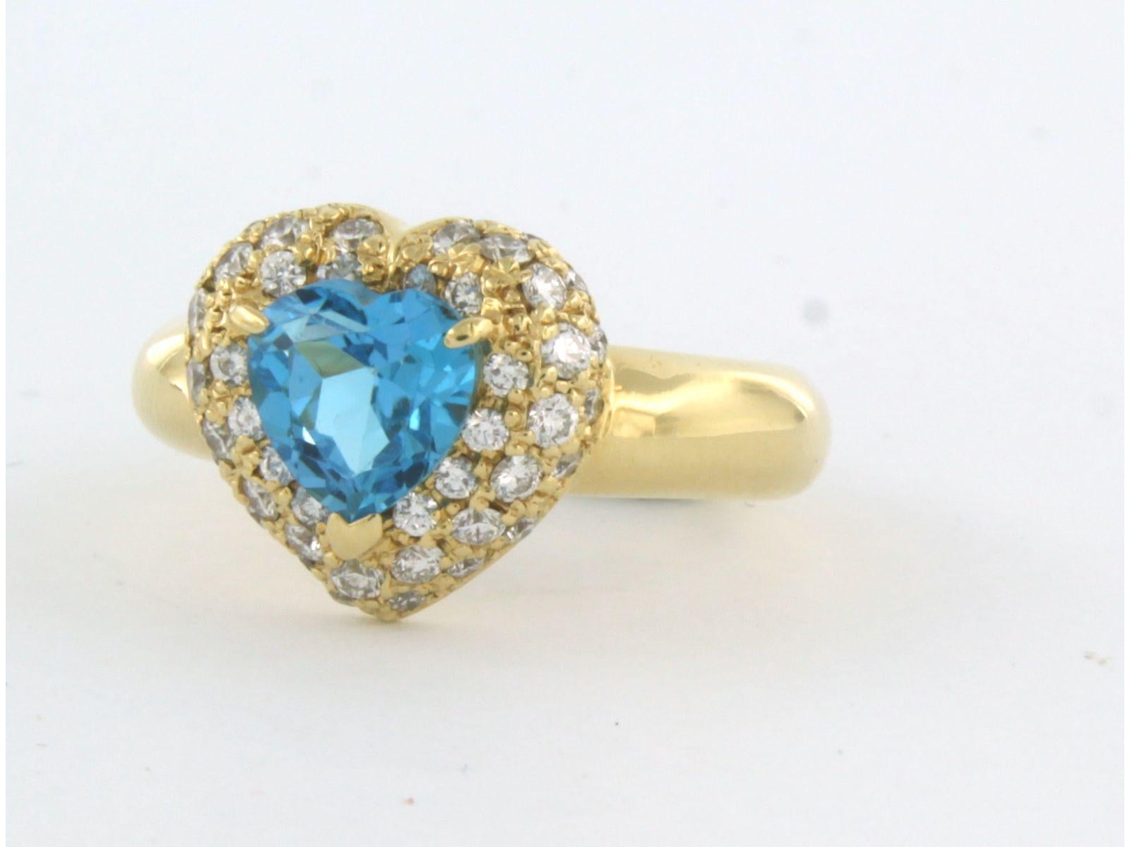 Brilliant Cut Ring with topaz and diamonds up to 0.61ct 18k yellow gold  For Sale