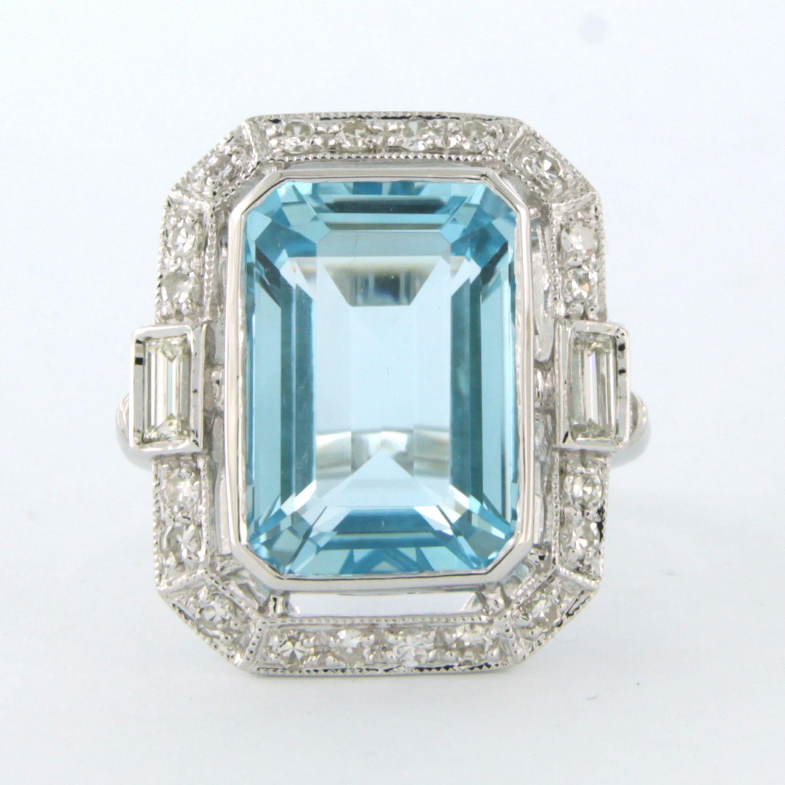 14k white gold ring set with topaz and baguette and single cut diamond. 0.86ct - F/G - VS/SI – ring size U.S. 6.75 – EU. 17.25(54)

detailed description:

The top of the ring is in an emerald shape measuring 2.1 cm by 1.5 cm wide by 7.3 mm