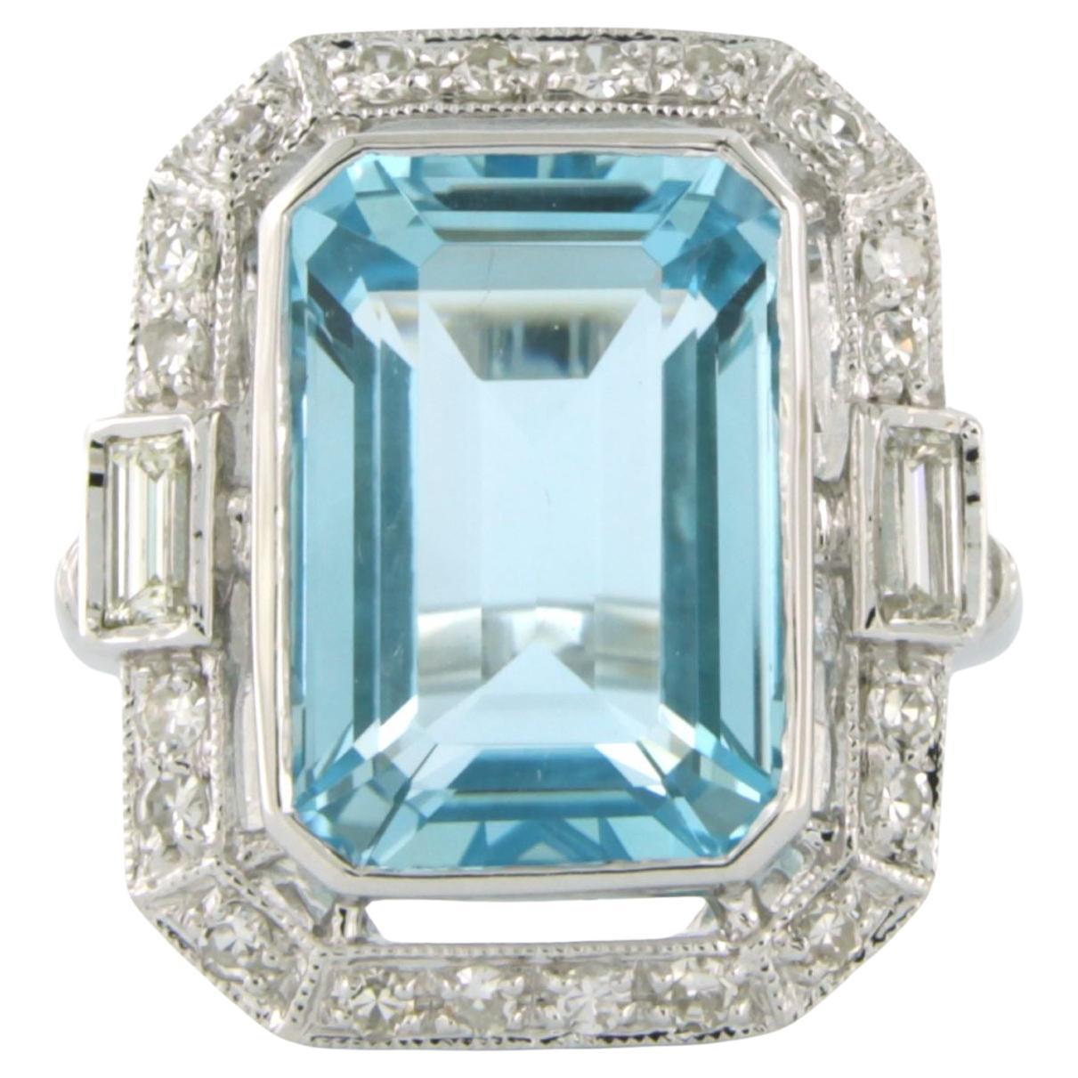 Ring with topaz and diamonds up to 0.86ct. 14k white gold