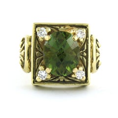 Ring with tourmaline and brilliant cut diamond up to 0.16ct 18k yellow gold