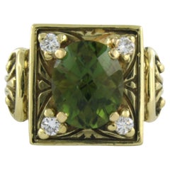 Ring with tourmaline and brilliant cut diamond up to 0.16ct 18k yellow gold