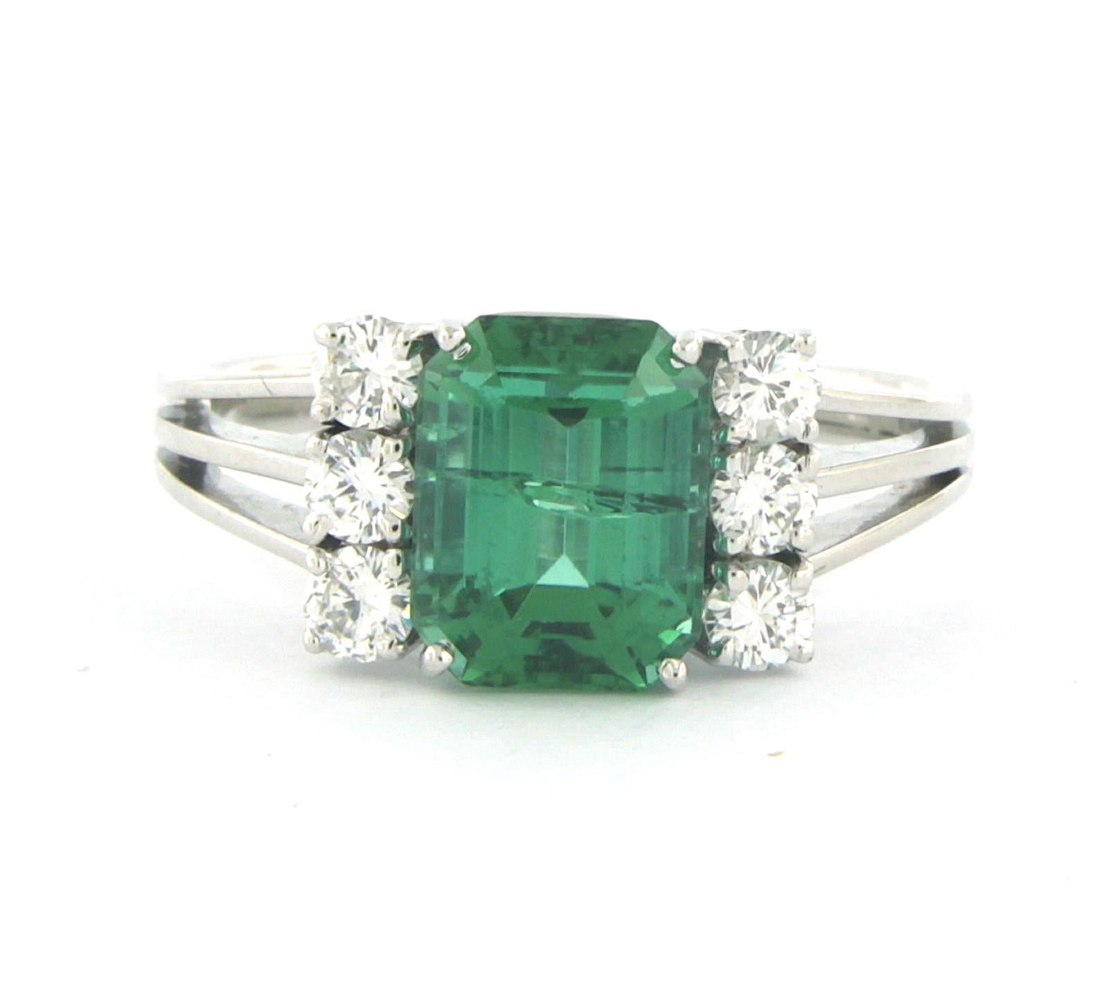 18k white gold ring set with tourmaline up to 3.43 ct and brilliant-cut diamond up to 0.60 ct - F/G - VS/SI - ring size US 10 - EU 19.75 (62)

Detailed description:

The top of the ring is 9.8 mm wide and 8.4 mm high.

Ring size US 10 - EU 19.75