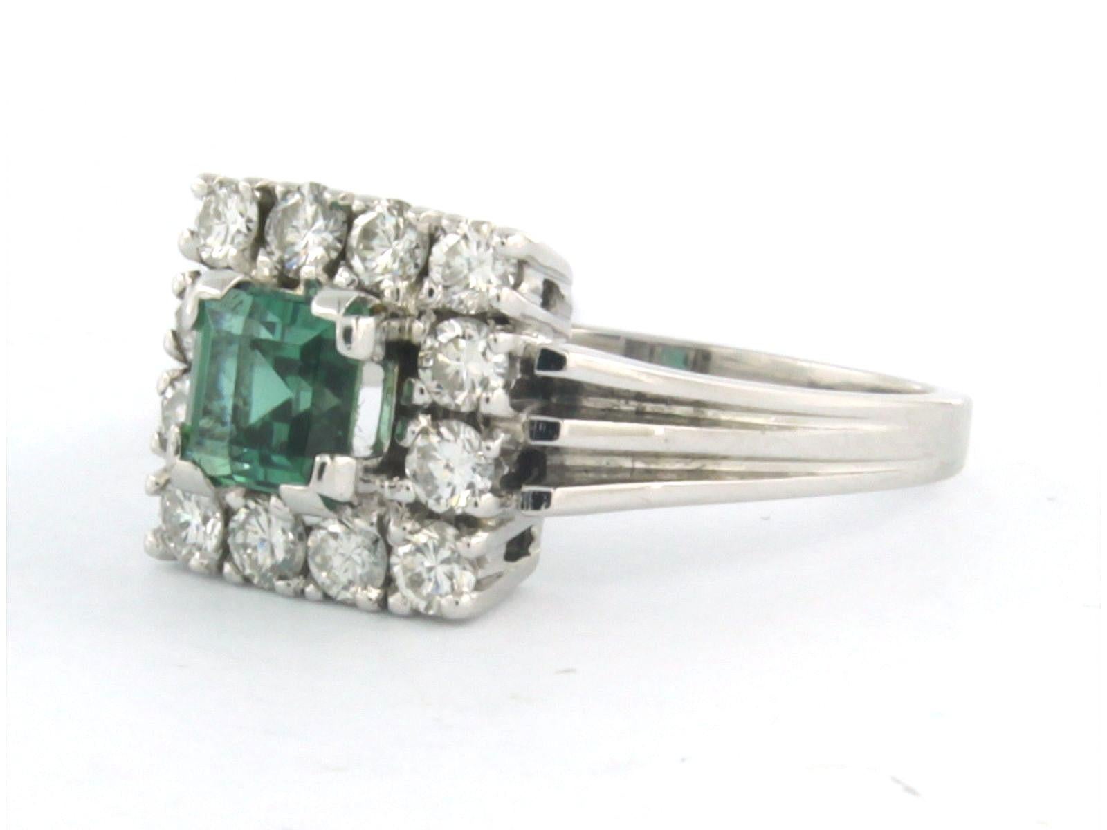 14k white gold ring set with tourmaline and brilliant cut diamonds up to 0.63ct - F/G - VS/SI - ring size US 6.75 - EU 17.25(54)

detailed description:

the top of the ring is 1.0 cm wide by 7.8 mm high

total weight: 5.0 grams

ring size US 6.75 -