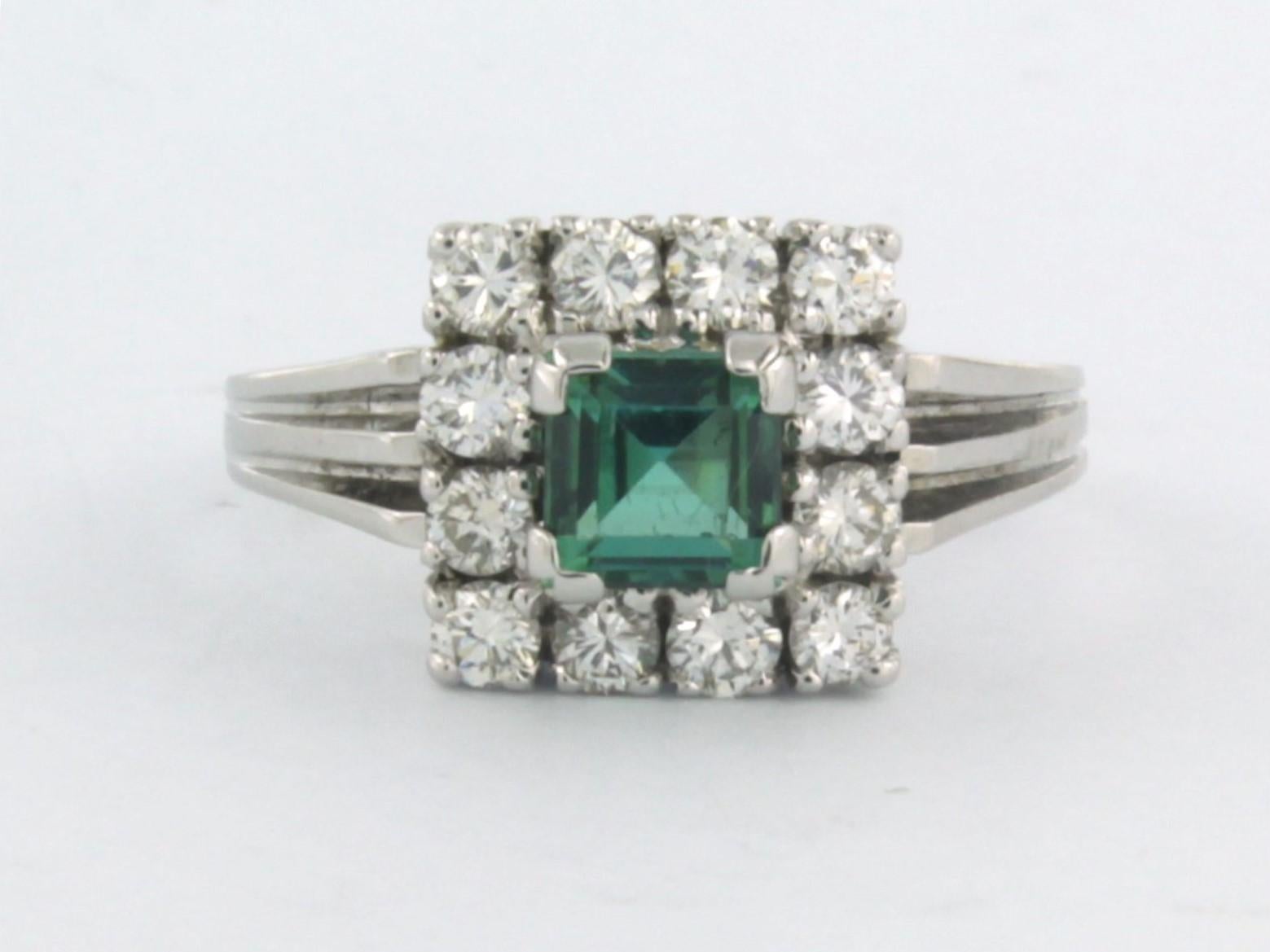 14k white gold ring set with tourmaline and brilliant cut diamonds up to 0.63ct - F/G - VS/SI - ring size US 6.75 - EU 17.25(54)

detailed description:

the top of the ring is 1.0 cm wide by 7.8 mm high

total weight: 5.0 grams

ring size US 6.75 -
