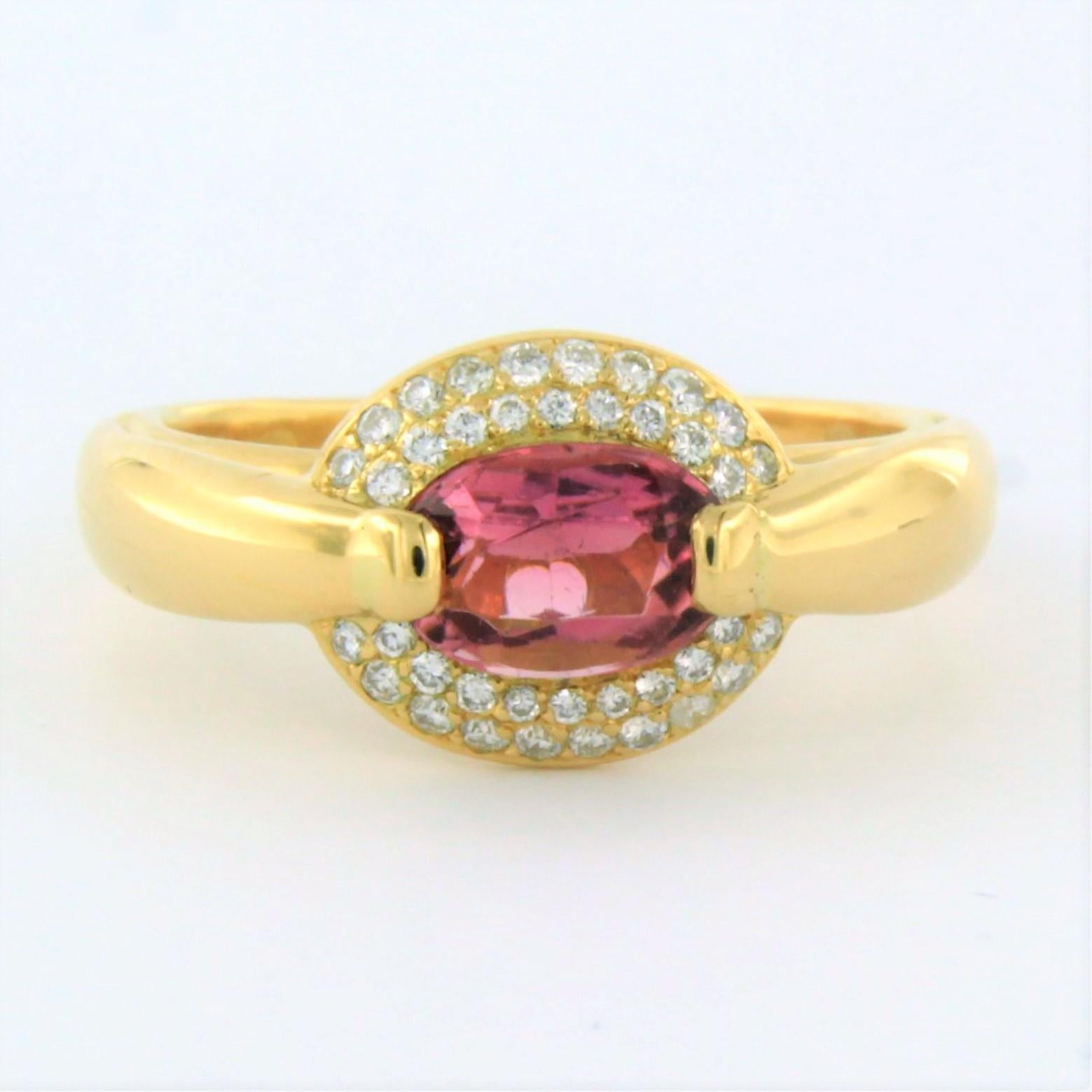 18k yellow gold ring with tourmaline and brilliant cut diamond. 0.70ct - F/G - VS/SI - ring size U.S. 8.5 - EU. 18.5(58)

detailed description

the top of the ring is 1.0 cm wide by 7.2 mm high

weight 8.3 grams

ring size U.S. 8.5 - EU. 18.5(58),