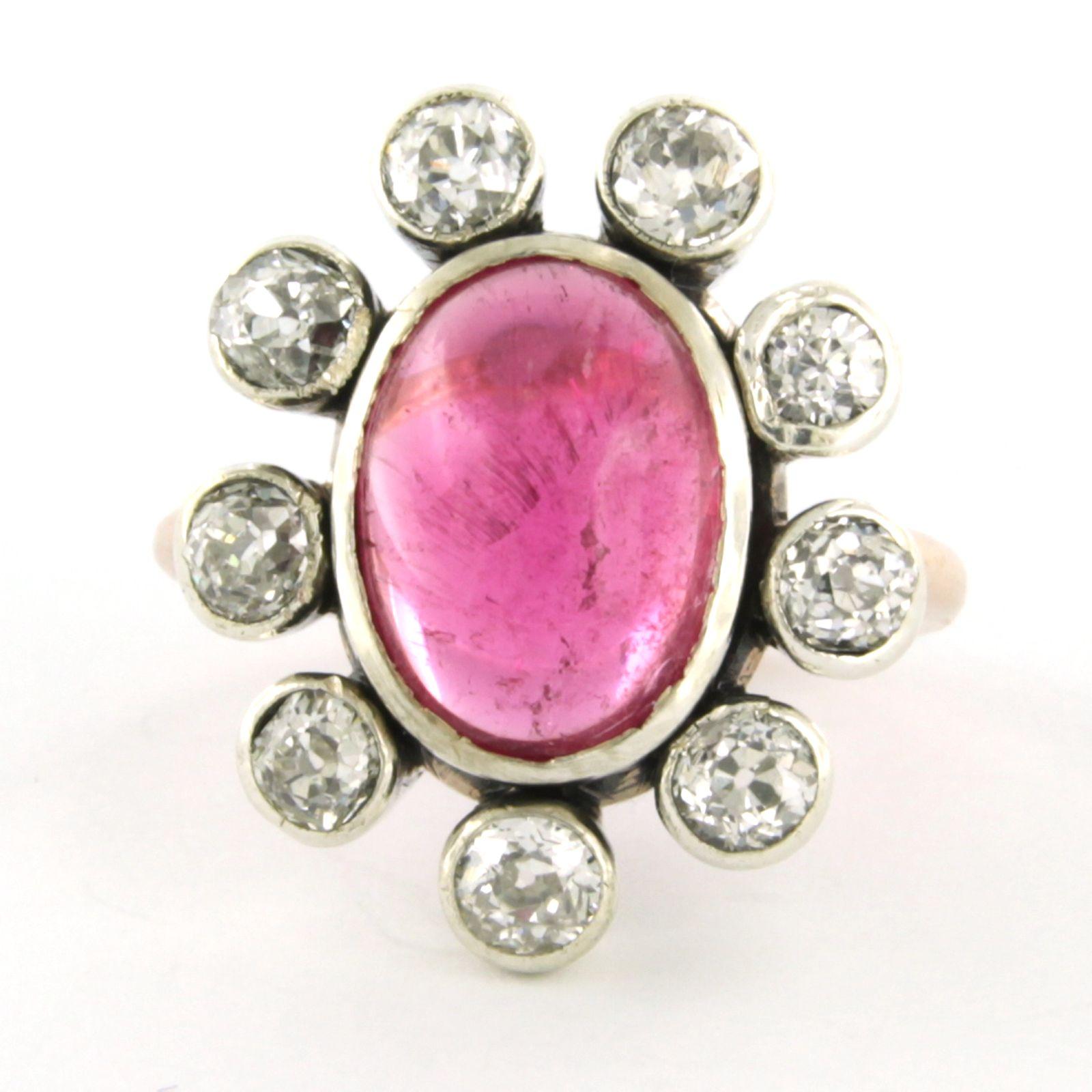 10k pink gold with silver ring set with tourmaline. approximately 5.00 ct and old mine cut diamonds up to. approx. 1.50 ct - ring size US. 6.5 - EU.  17 (53)

Detailed description

The top of the ring is 2.1 cm wide and 7.0 mm high

Ring size US 6.5