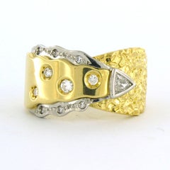 Bague avec diamants triangulaires et taille brillant jusqu'à 0,22ct Or 18k et platine