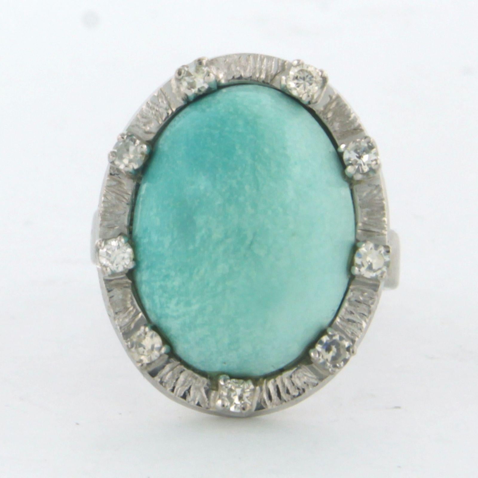 Anello in oro bianco 18 kt con turchese e diamanti taglio singolo 0,18ct - F/G - VS/SI - misura S.S. White 4,25 - EU. 14.75(46.5)

La parte superiore dell'anello misura 1,9 cm di larghezza e 9,0 mm di altezza.

peso 7,2 grammi

Misura dell'anello