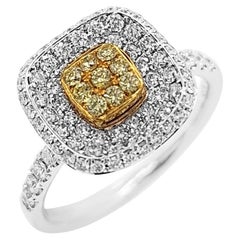 Anillo de oro y platino de 18 quilates con diamante amarillo y diamante blanco, talla brillante redonda