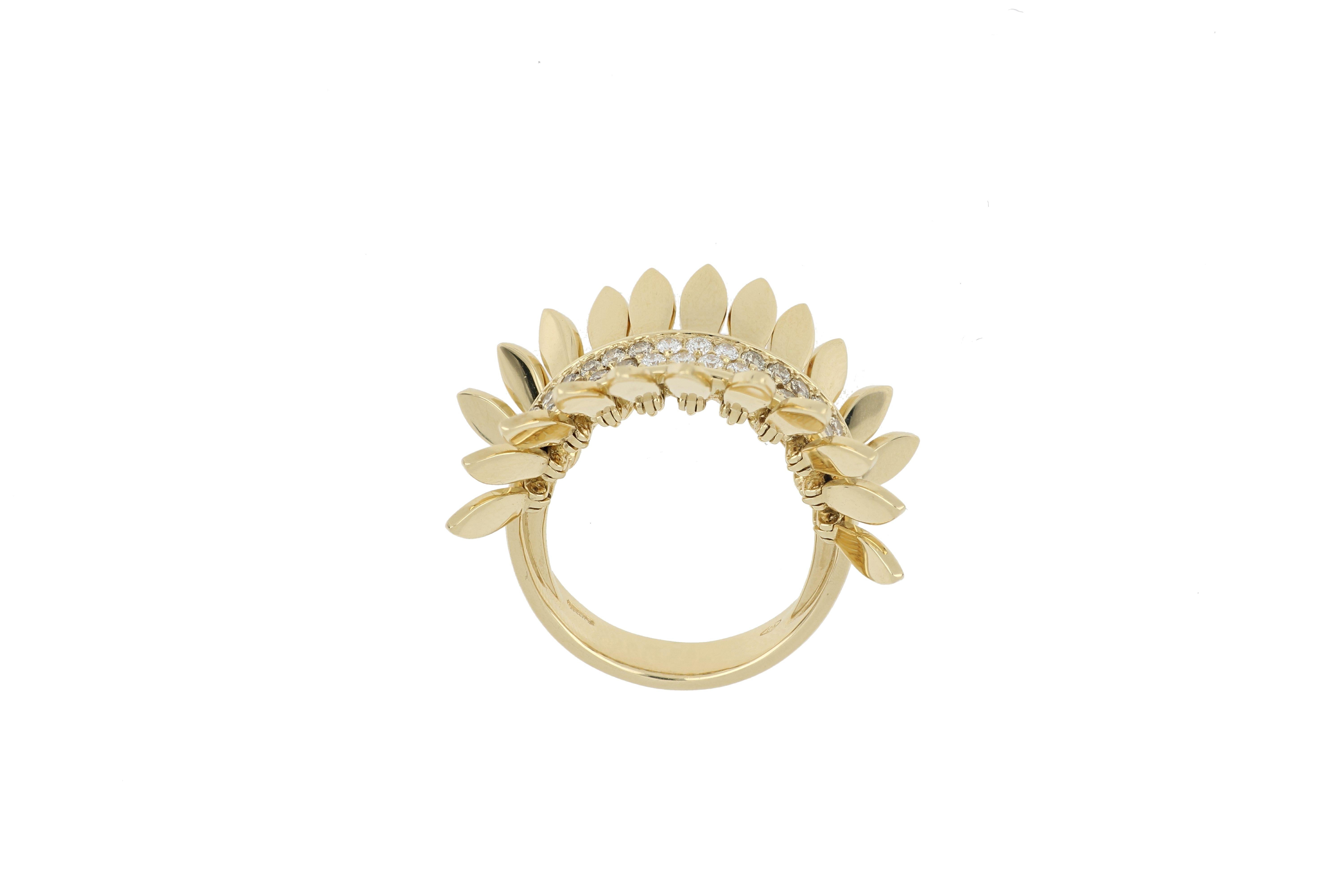 This gorgeous ring design in the Spettinato collection was inspired by techniques seen in hand knitting, macrame, and batik and wanting to toy with the concept of elegance. 18k yellow gold, this stunning ring is adorned beautifully with white