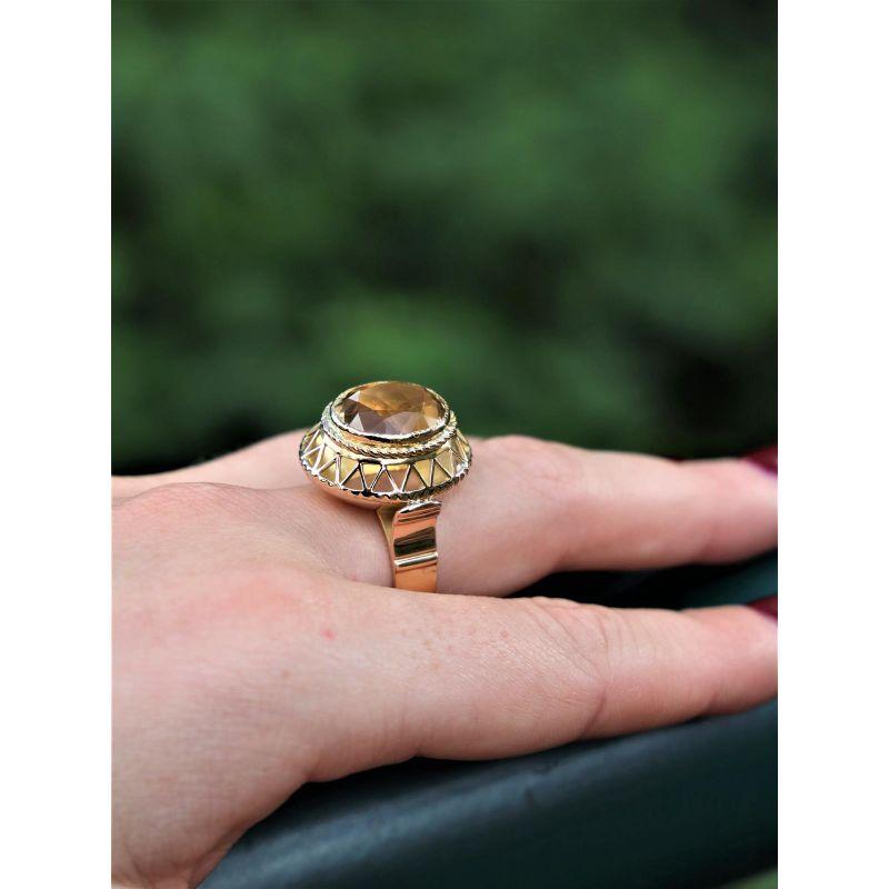 Ring yellow gold 750 thousandth (18 carats). yellow citrine of 5.08 cts. old setting. width of the ring 0.4 cm. width of the ring 2.2 cm. turn of finger 59. hiboux punch. excellent condition
