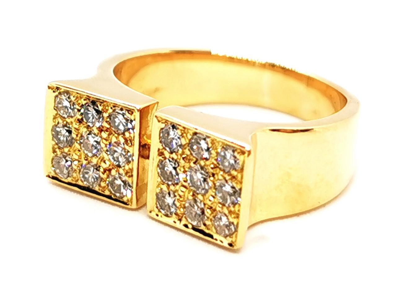 Diamond ring in yellow gold 750 thousandths (18 carats). geometric pattern. set with 18 brilliant diamonds. about 0.015ct each. total weight diamonds: about 0.27ct. dimensions of the pattern: 0.76 cm X 1.71 cm. finger circumference: 52. total