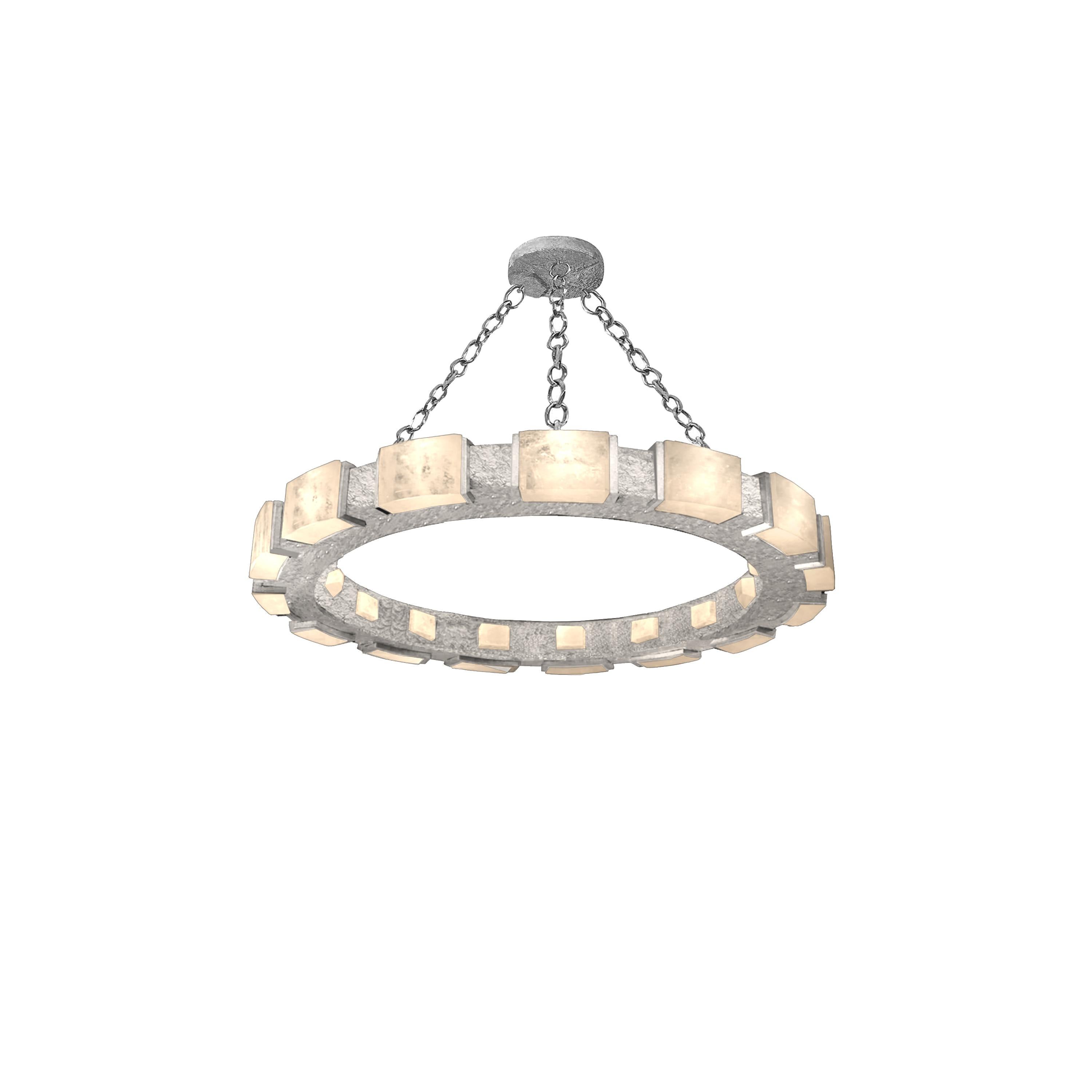 Lampadario in cristallo di rocca con dettagli in nichel martellato. Creato dalla Phoenix Gallery, NYC.
15 prese installate. Utilizza 15 lampadine a candelabro. 60 watt ciascuna, totale 900W max.
Dimensioni e finiture personalizzate su richiesta.
