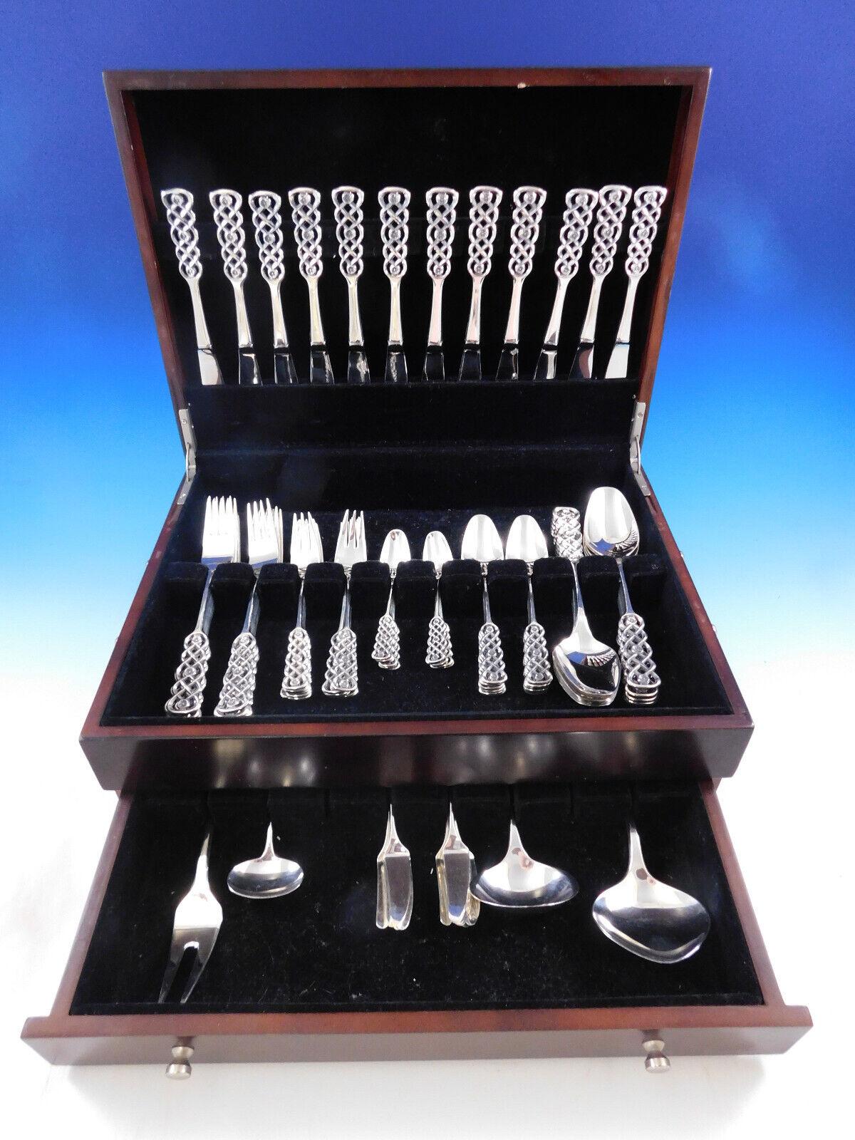 Ringebu by David Andersen 

Scarce 830S silver Set for 12 in the unique open handle pattern Ringebu by David Andersen - 88 pieces. This is one of the most unique silver flatware designs that you will find - even the knife has the fabulous openwork