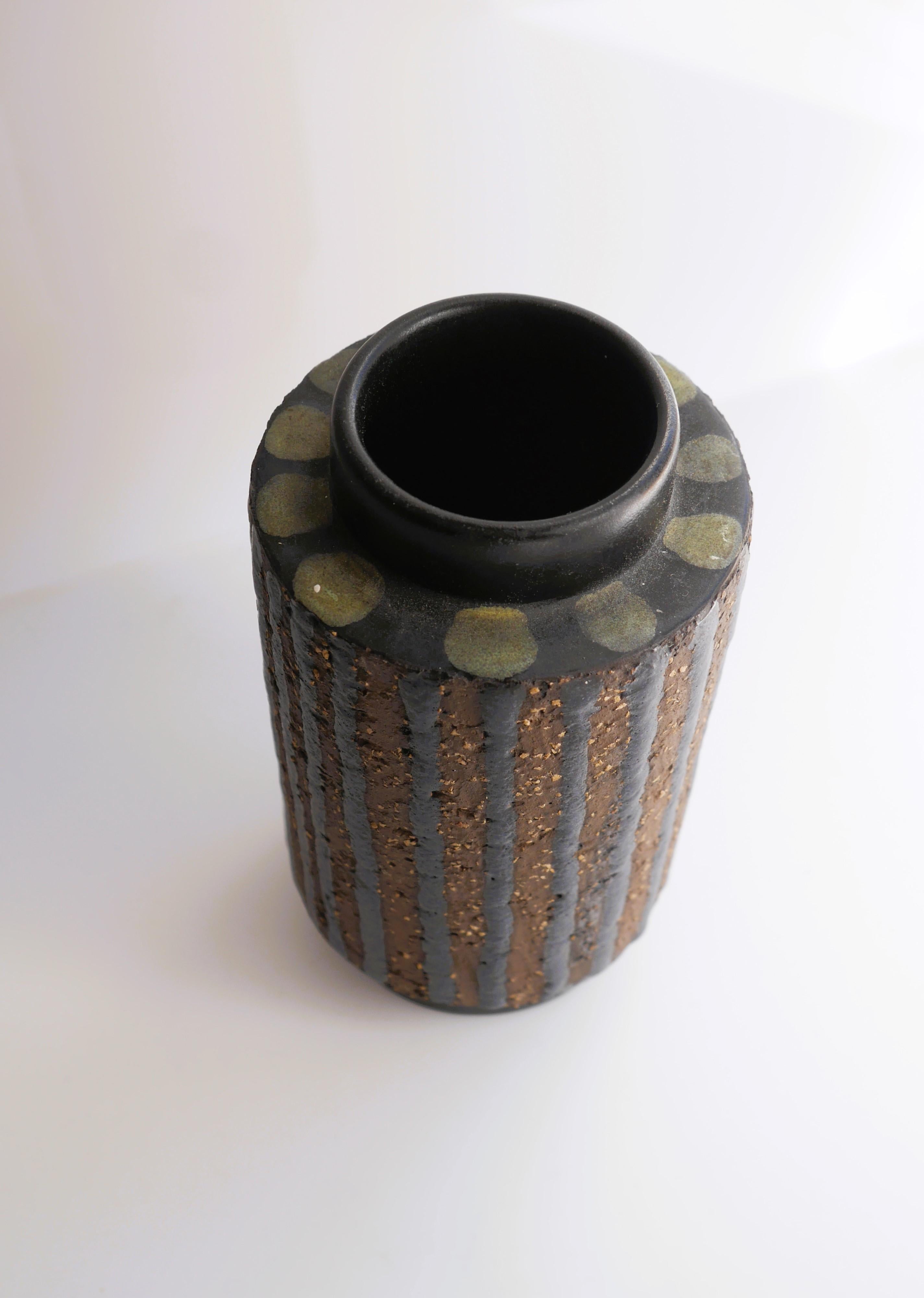 A brutalist mid-century art vase known as 