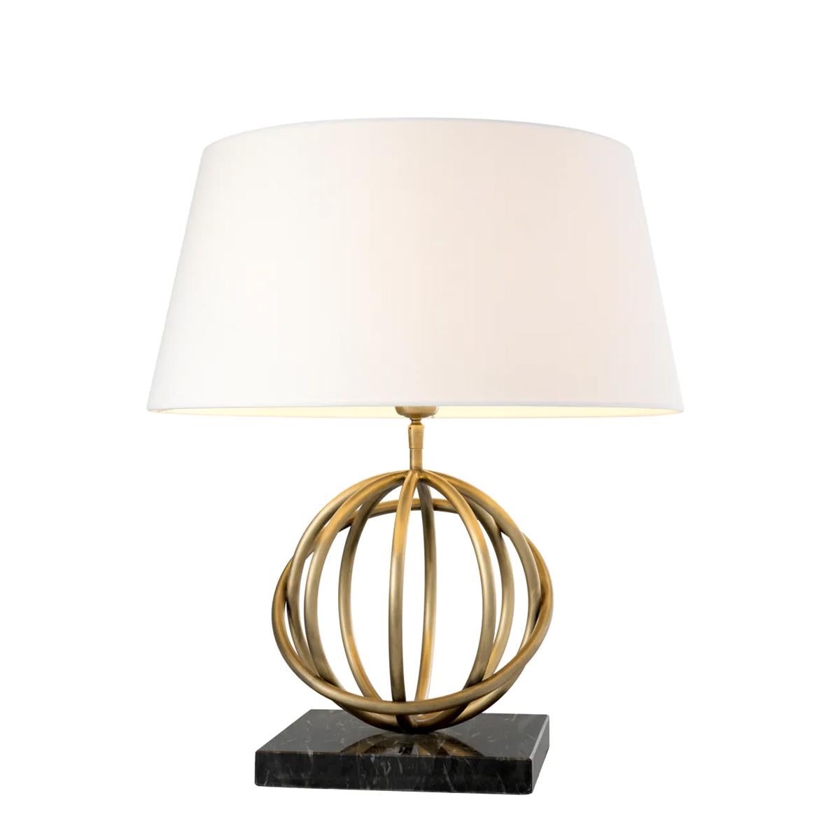 Table Lamp Rings Brass with solid brass rings base
in vintage finish, on granite base. Including a white
lampshade in fabric, shade dimensions: L50xD50xH27cm.
Rings diameter: 27cm.
1 bulb, lamp holer type E27, max 40 watt, dimmable,
bulb not