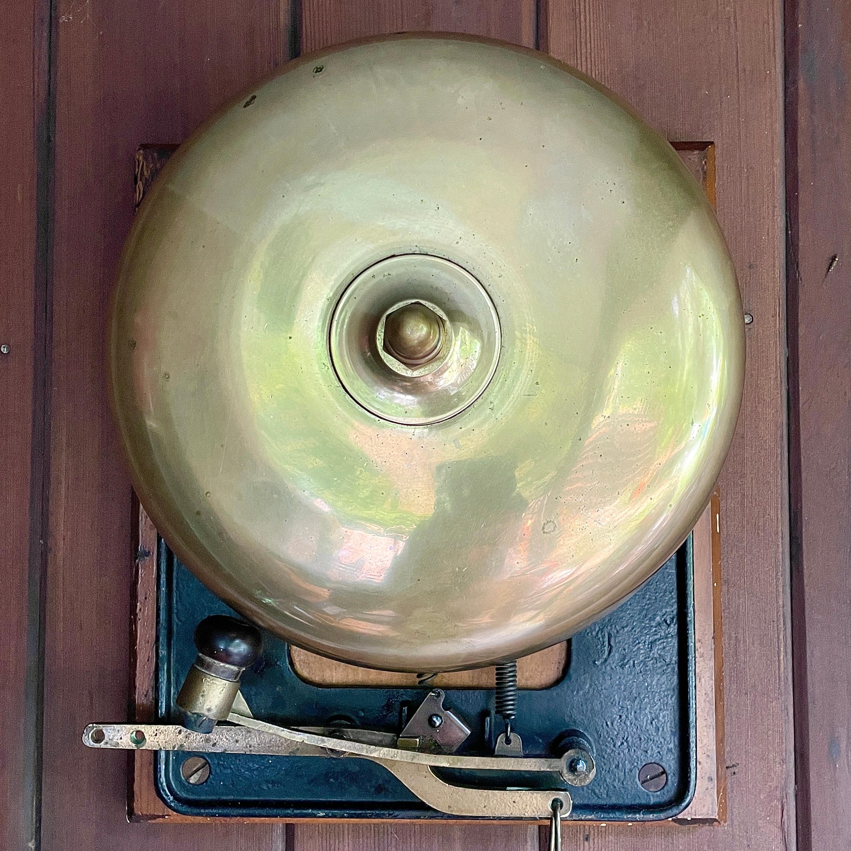 Beautiful and more uncommon in this large size, a 12 inch Gong! Long period brass chain and handle are attached. Cast iron wall mounting plate bolted on wood panel for temporary hanging. Wood can be removed and bell bolted directly into the wall or