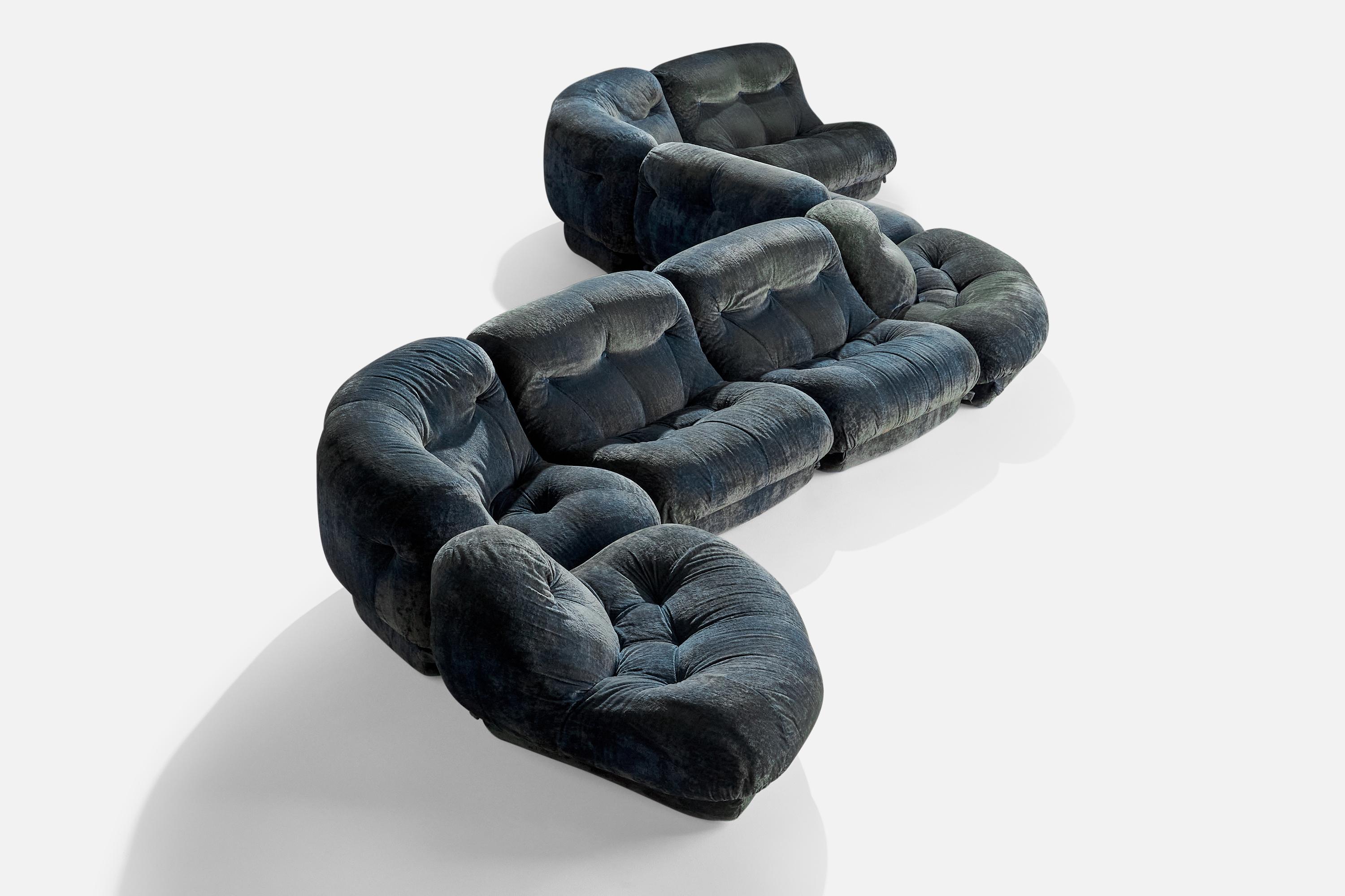 A large blue fabric modular sectional sofa designed by Rino Maturi and produced by MIMO Padova, Italy, c. 1970s.

Seat height 16”

Dimensions variable.