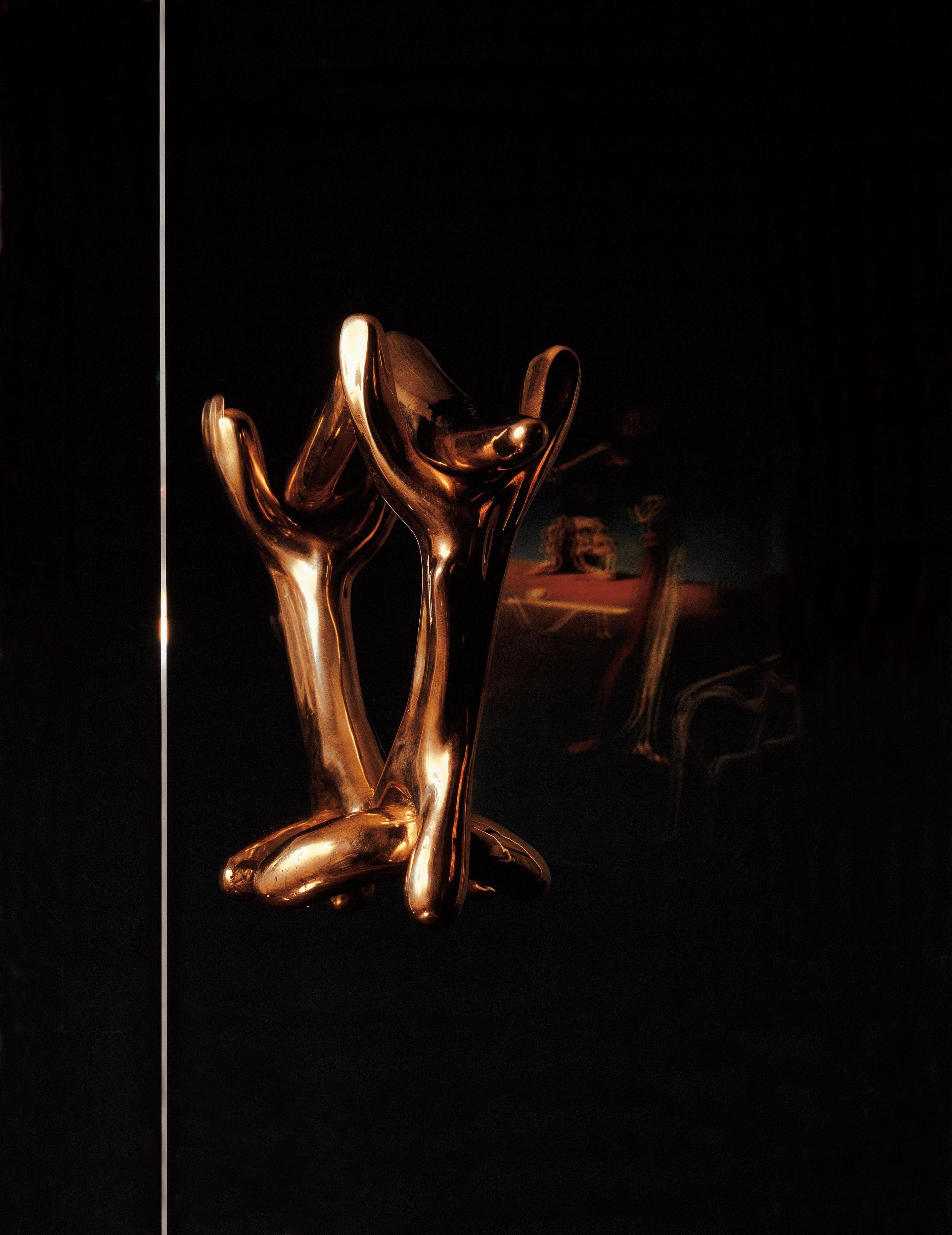 Three polished lacquered cast bronze pieces joined together.

During the ‘thirties in Paris, Salvador Dalí surrounded himself with a circle of friends involved in the application of art to varied disciplines, above and beyond the study of pure